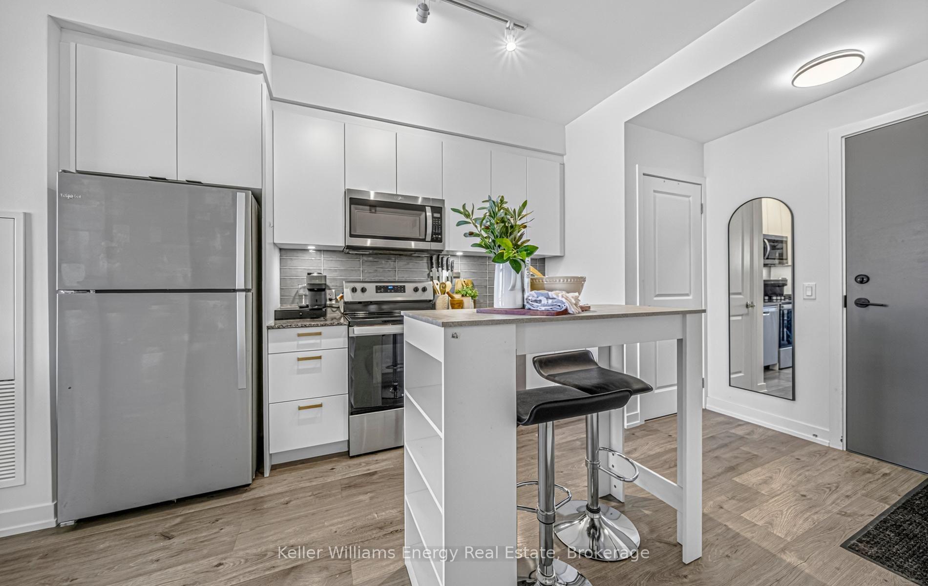 Photo 3 of Unit 301, 1010 Dundas Street E, Whitby, Pringle Creek — HOMEH