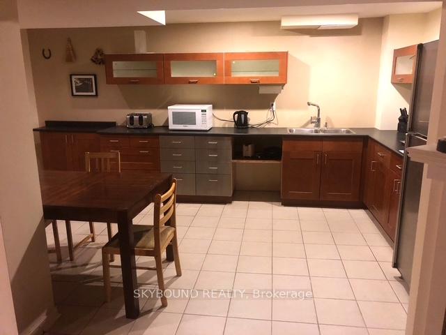 Front of Unit Basement Apartment, 4833 Wild Rose Street