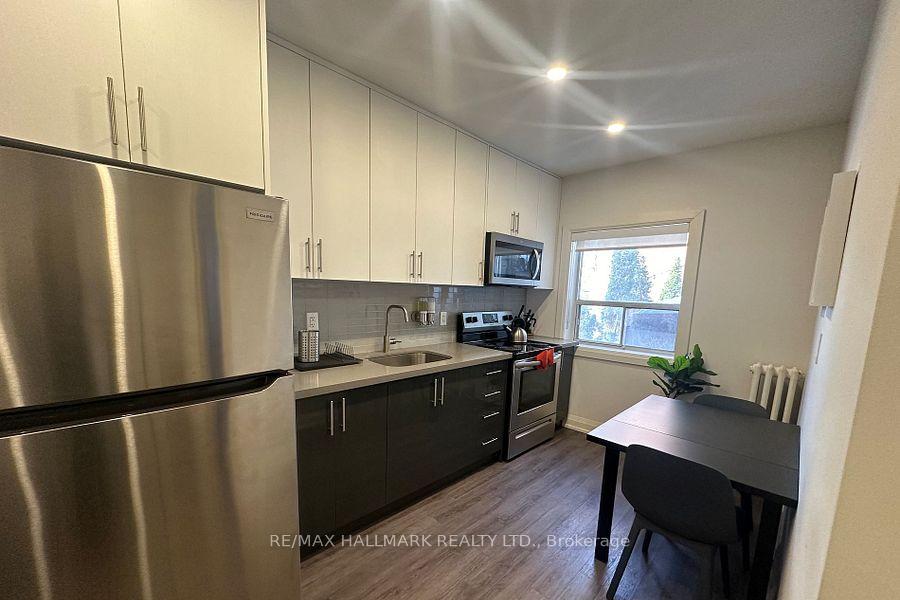 Photo 3 of Unit 4, 595 St Clair Avenue W, Toronto, Wychwood — HOMEH