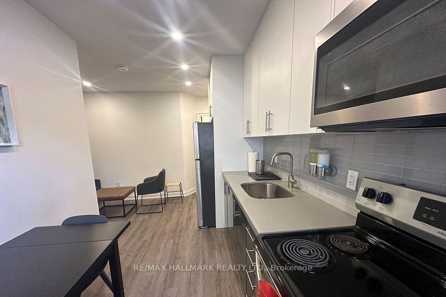 Photo 4 of Unit 4, 595 St Clair Avenue W, Toronto, Wychwood — HOMEH