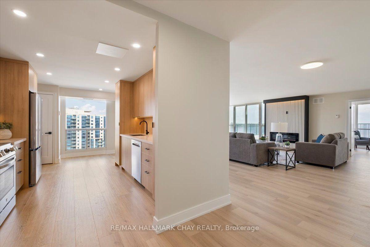 Photo 5 of Unit 1402, 65 Ellen Street, Barrie, Lakeshore — HOMEH