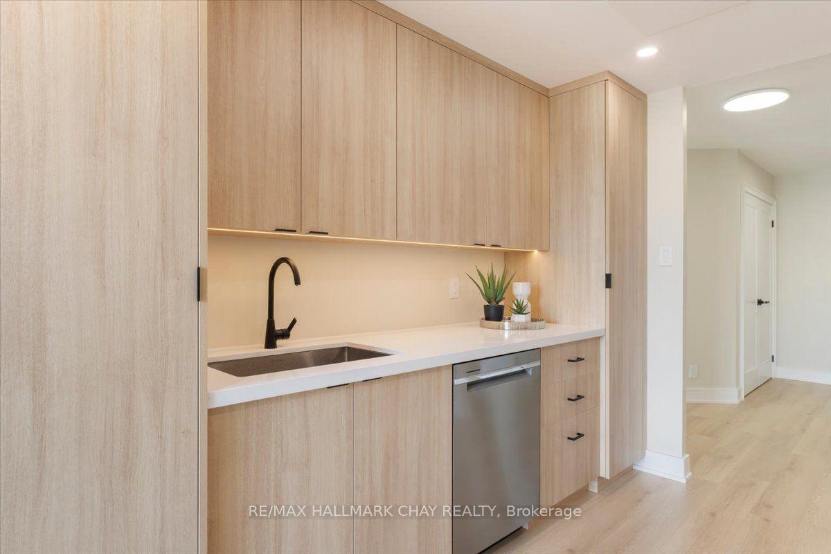 Photo 8 of Unit 1402, 65 Ellen Street, Barrie, Lakeshore — HOMEH