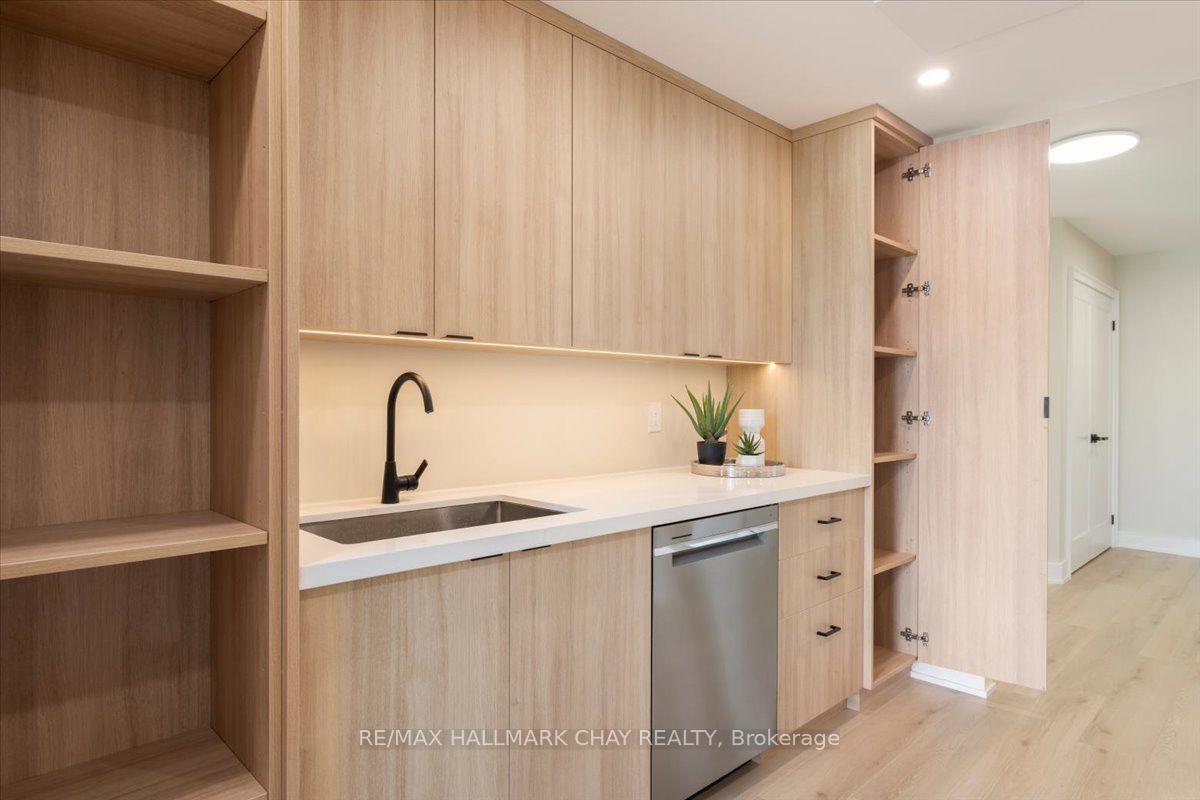 Photo 9 of Unit 1402, 65 Ellen Street, Barrie, Lakeshore — HOMEH
