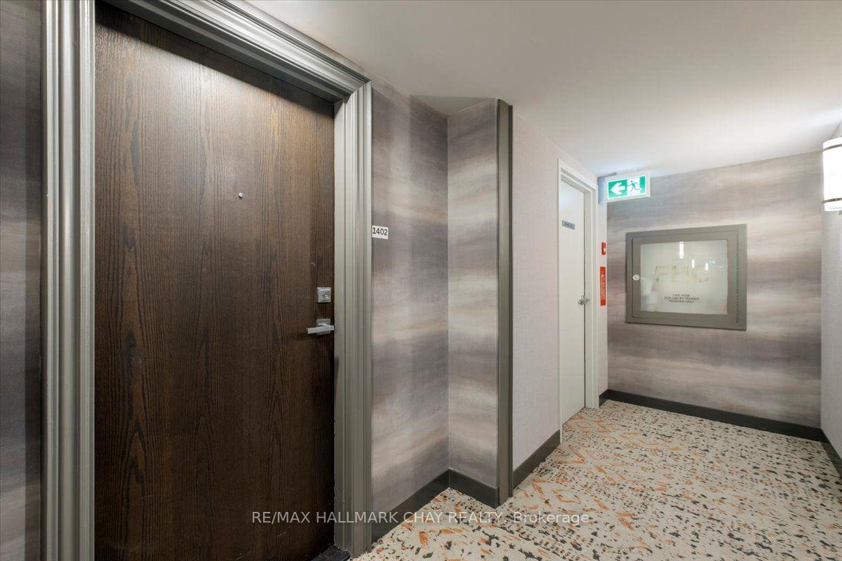 Photo 32 of Unit 1402, 65 Ellen Street, Barrie, Lakeshore — HOMEH