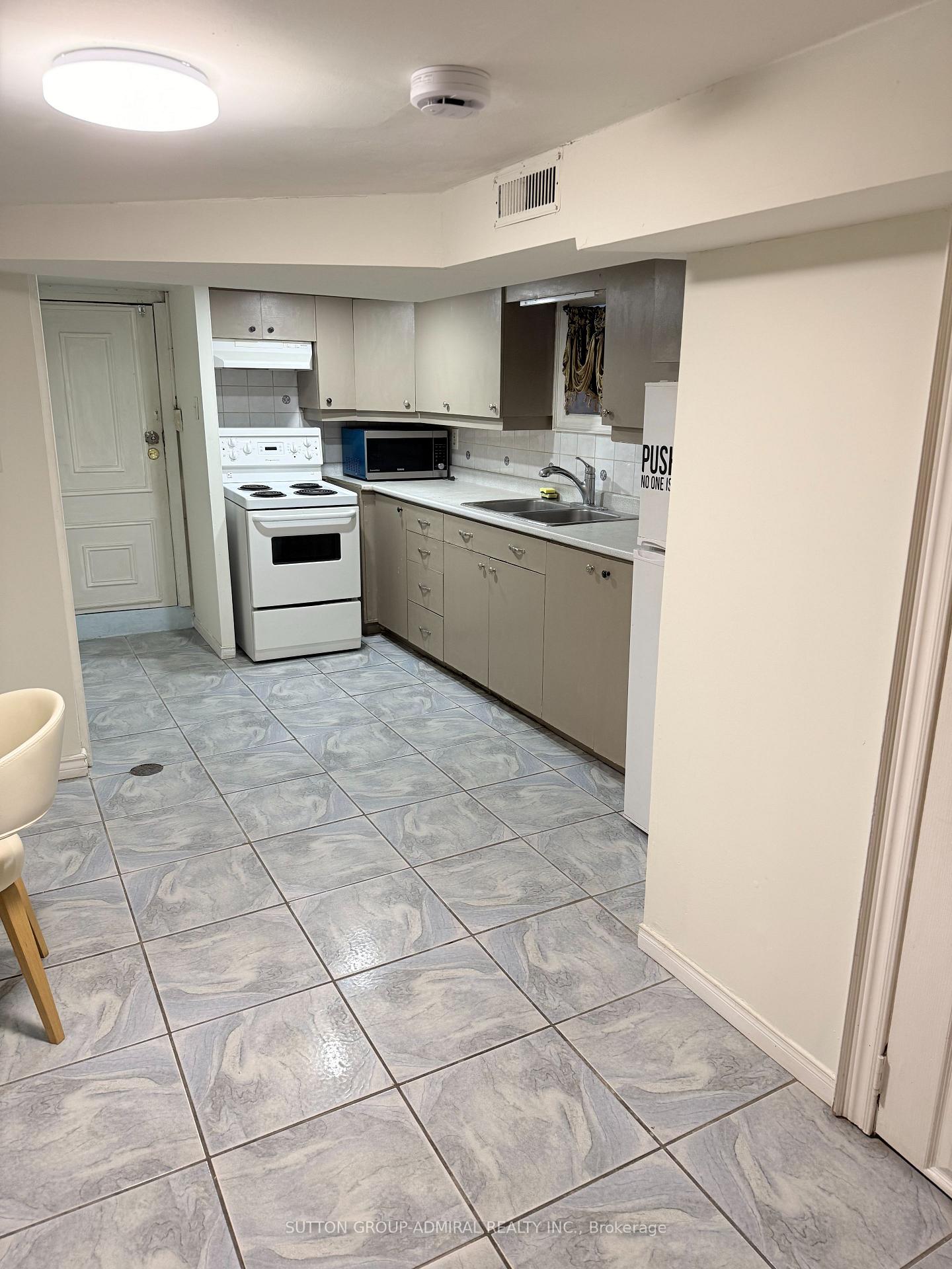 Photo 6 of Unit Main, 241 Dunraven Drive, Toronto, Keelesdale-Eglinton West — HOMEH