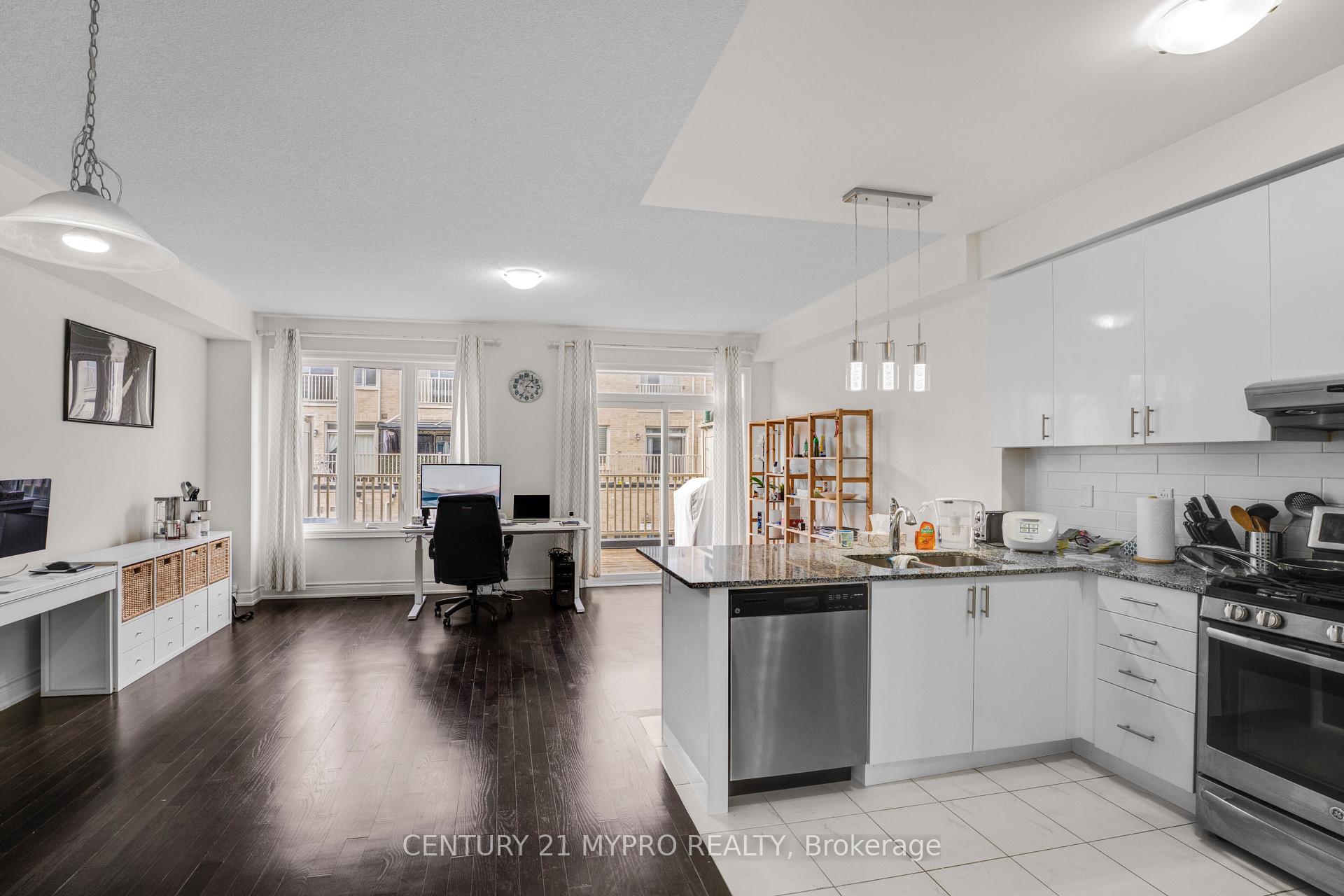 Photo 13 of 12 Brushwood Drive, Brampton, Bram West — HOMEH