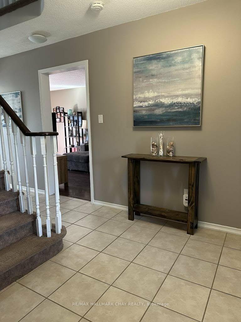 Photo 7 of 61 Carruthers Crescent, Barrie, Grove East — HOMEH