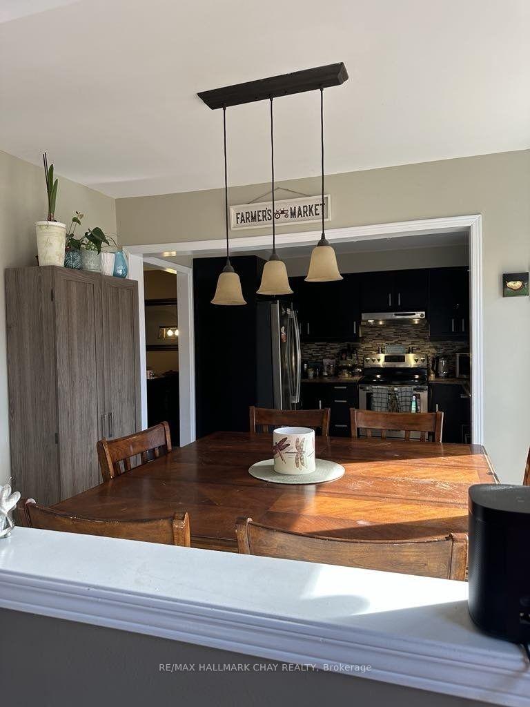 Photo 9 of 61 Carruthers Crescent, Barrie, Grove East — HOMEH
