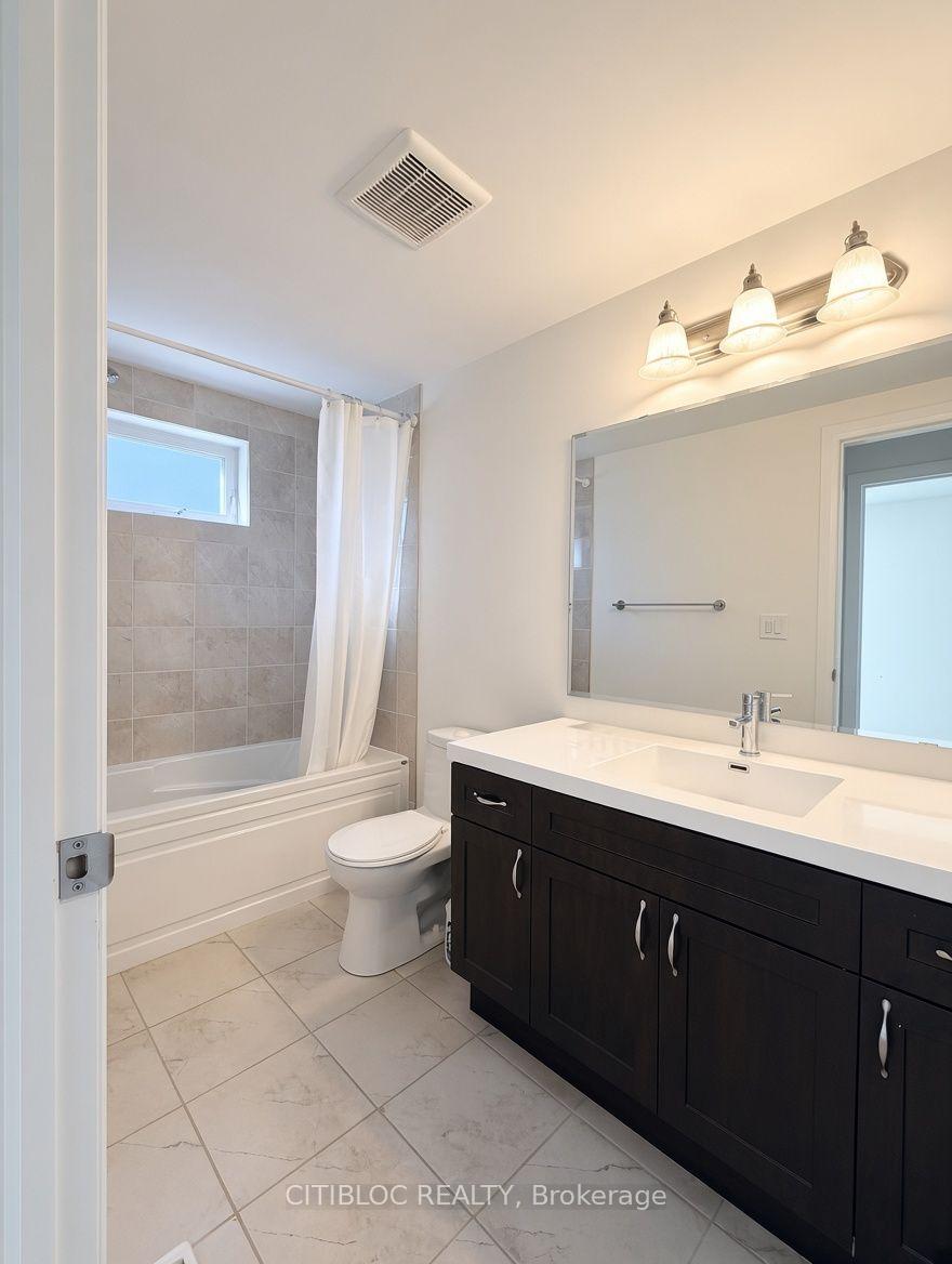 Photo 9 of 22 Sarah Jackson Crescent, North York, Downsview-Roding-CFB — HOMEH
