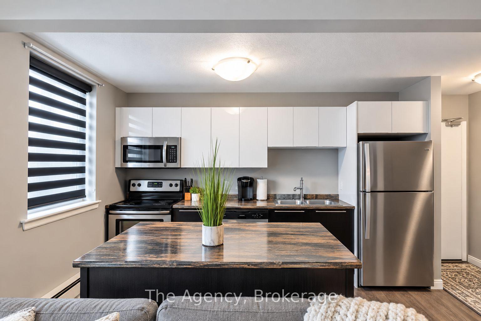 Photo 2 of Unit 2, 4538 Huron Street, Niagara Falls, Downtown — HOMEH