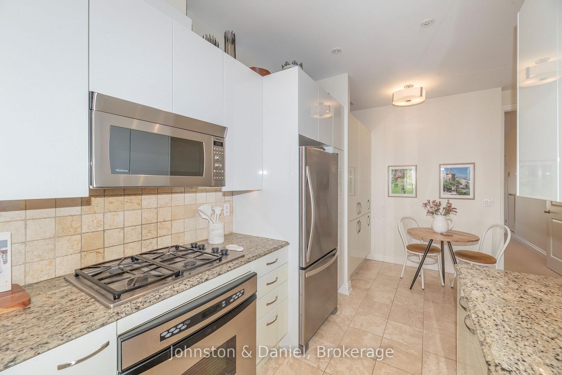 Photo 11 of Unit 1105, 48 St Clair Avenue W, Toronto, Yonge-St. Clair — HOMEH