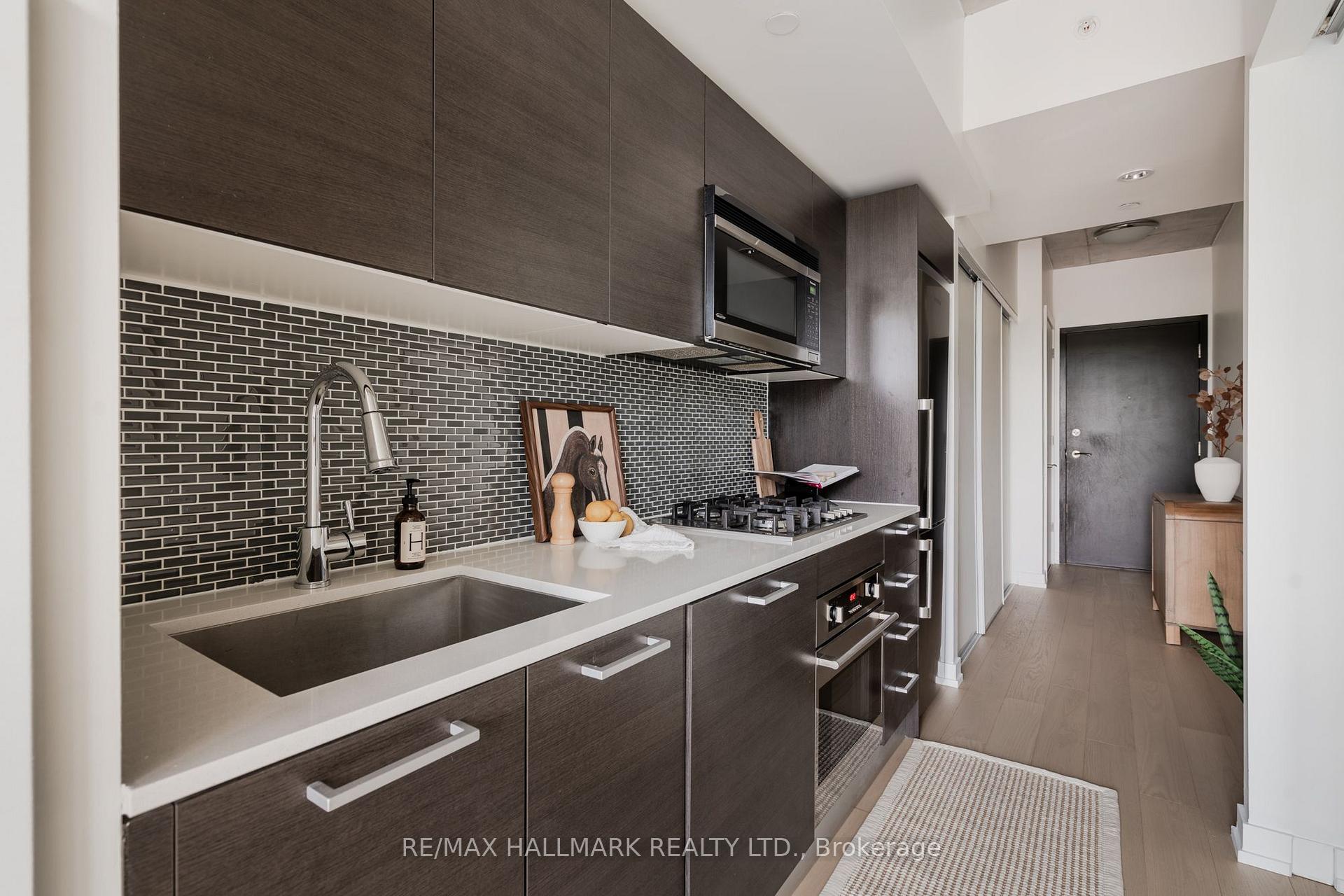 Photo 8 of Unit 404, 60 Haslett Avenue, Toronto, The Beaches — HOMEH