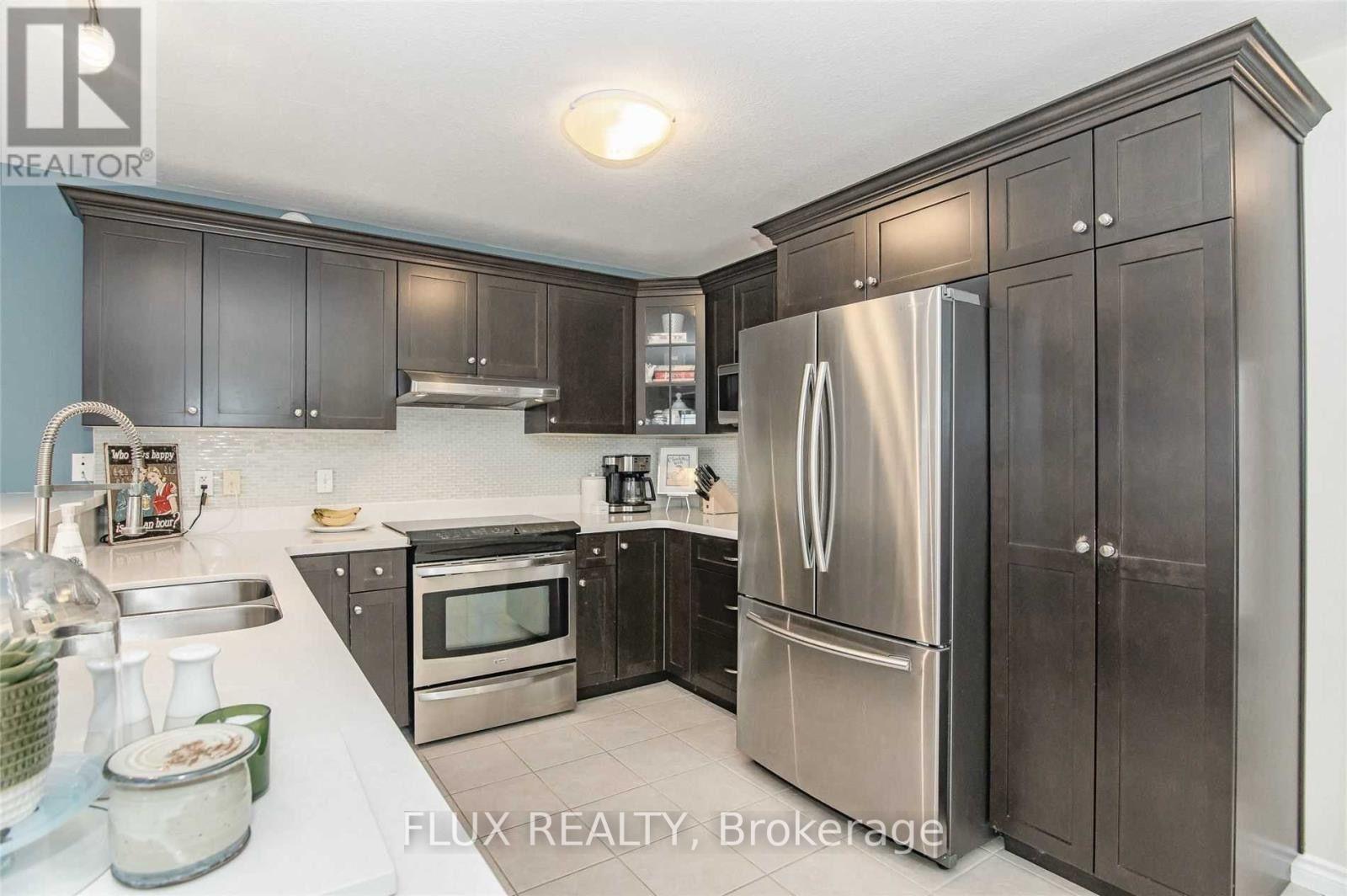 Photo 12 of 54 Ingram Drive, Guelph, Victoria North — HOMEH