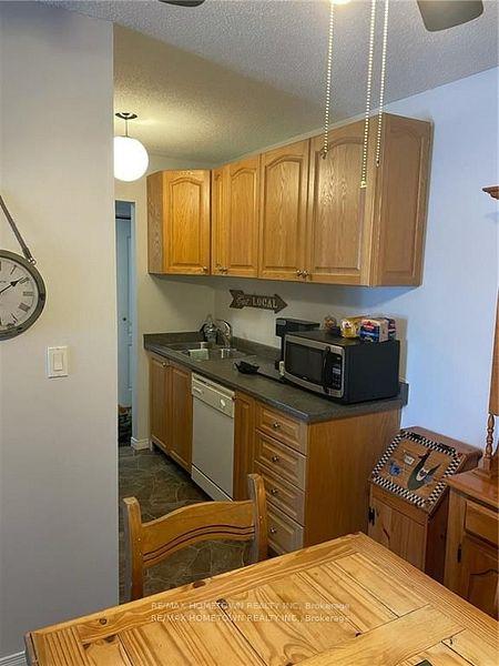 Photo 7 of Unit 8, 819 Macodrum Drive, Brockville, Brockville — HOMEH
