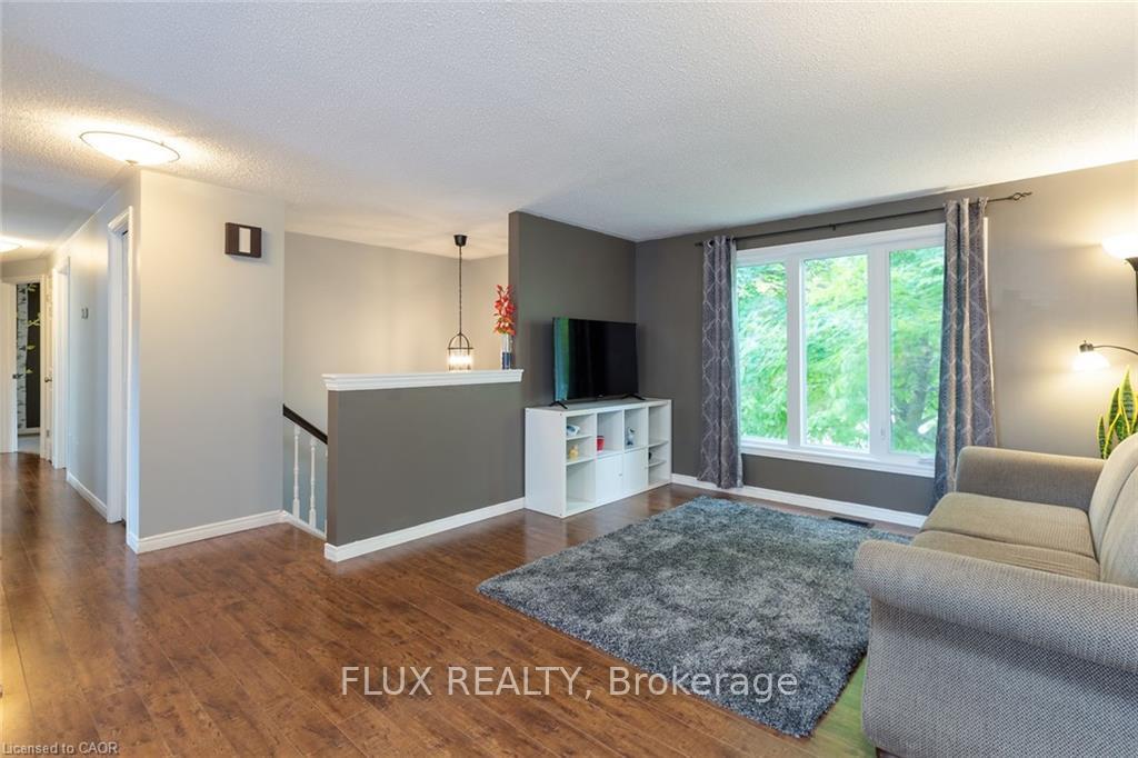 Photo 5 of Unit 1, 63 Imperial Road N, Guelph, Willow West/Sugarbush/West Acres — HOMEH