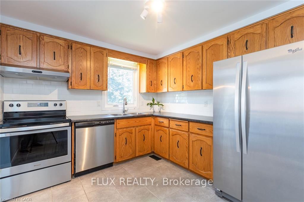 Photo 7 of Unit 1, 63 Imperial Road N, Guelph, Willow West/Sugarbush/West Acres — HOMEH