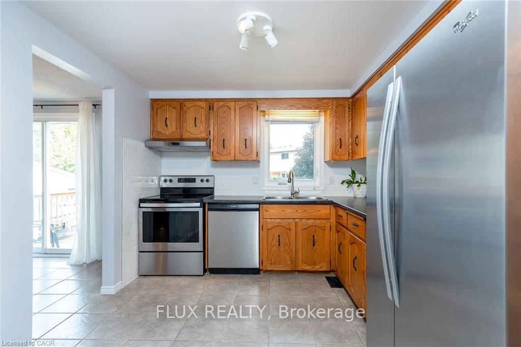 Photo 9 of Unit 1, 63 Imperial Road N, Guelph, Willow West/Sugarbush/West Acres — HOMEH