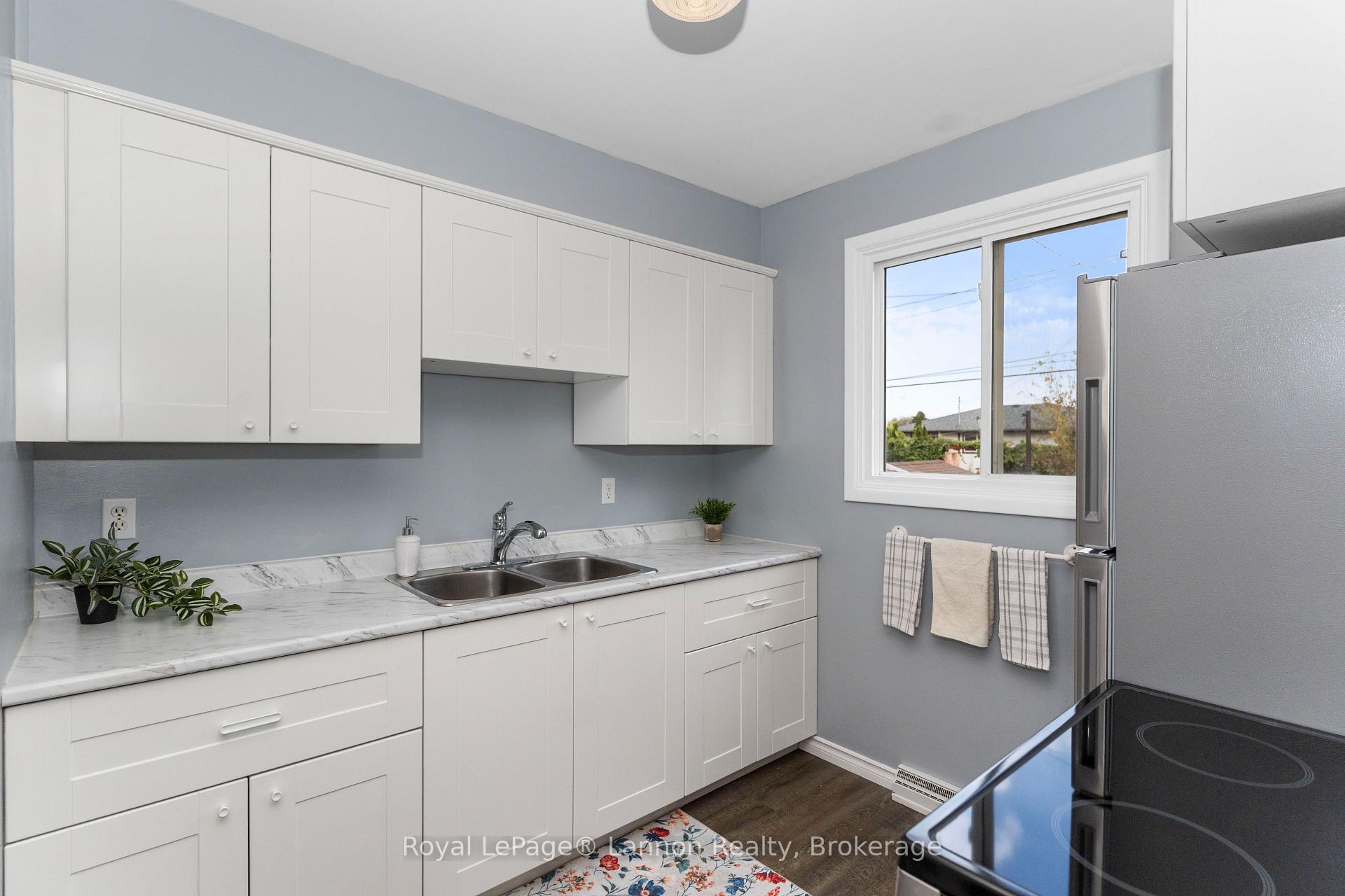Photo 2 of 103A Redwood Avenue W, Thunder Bay, Northwood Park — HOMEH