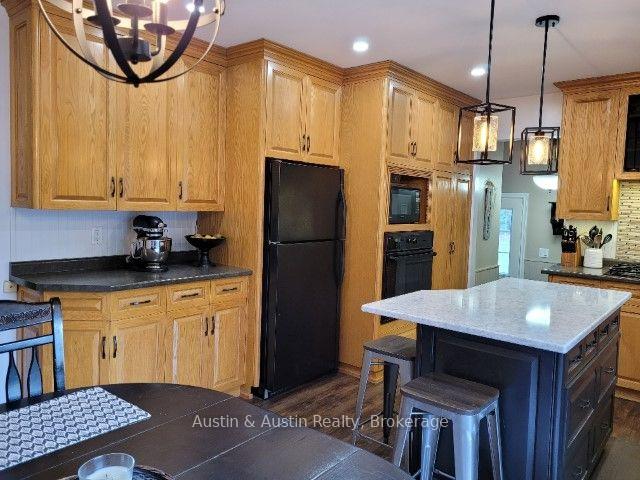 Photo 5 of 257 McMillan Crescent, Dryden, Barclay — HOMEH