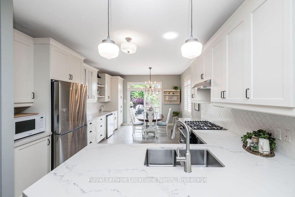 Photo 9 of 51 Christy Drive, Wasaga Beach — HOMEH
