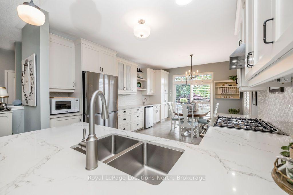 Photo 10 of 51 Christy Drive, Wasaga Beach — HOMEH