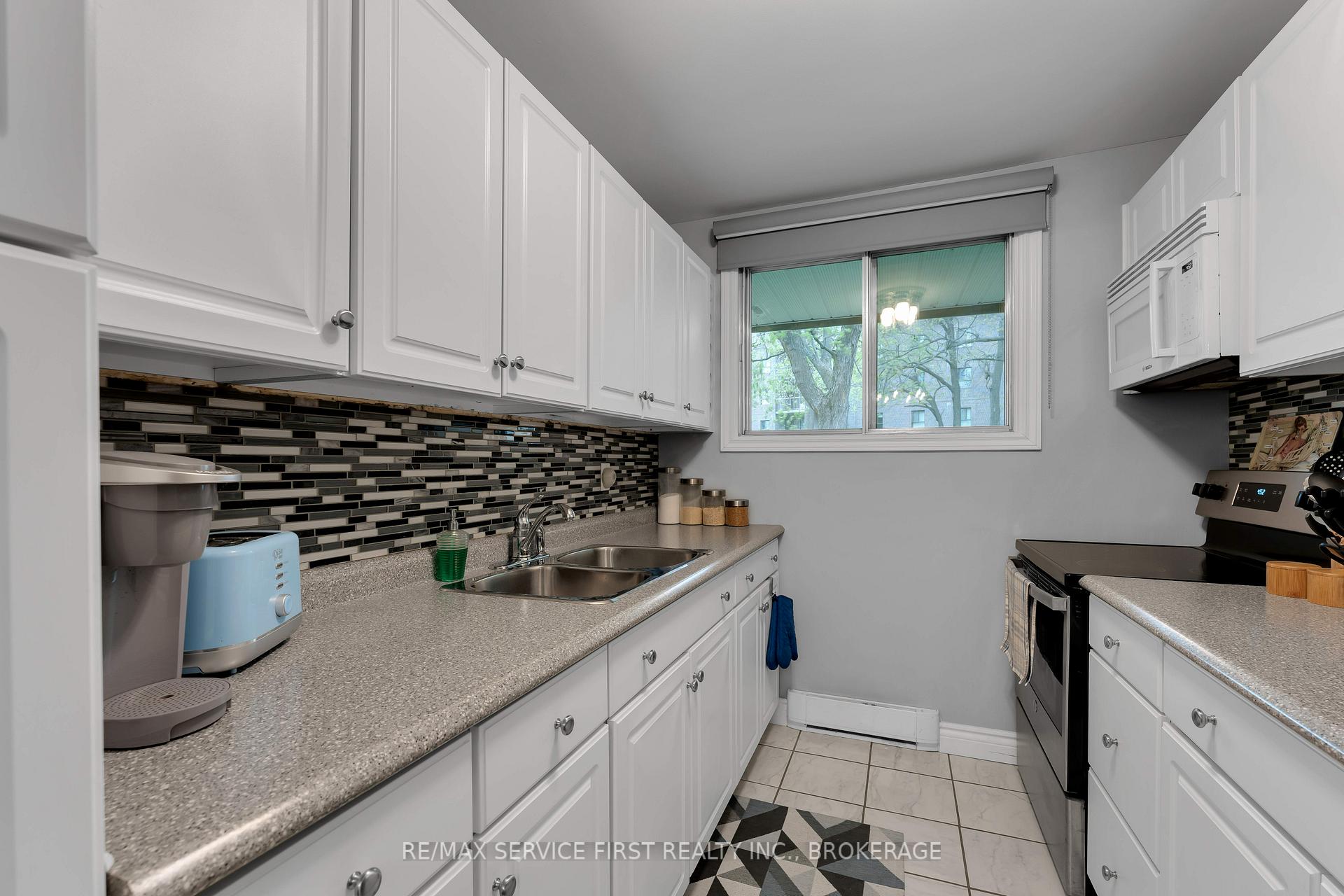 Photo 12 of Unit 103, 1010 Pembridge Crescent, Kingston, North of Taylor-Kidd Blvd — HOMEH