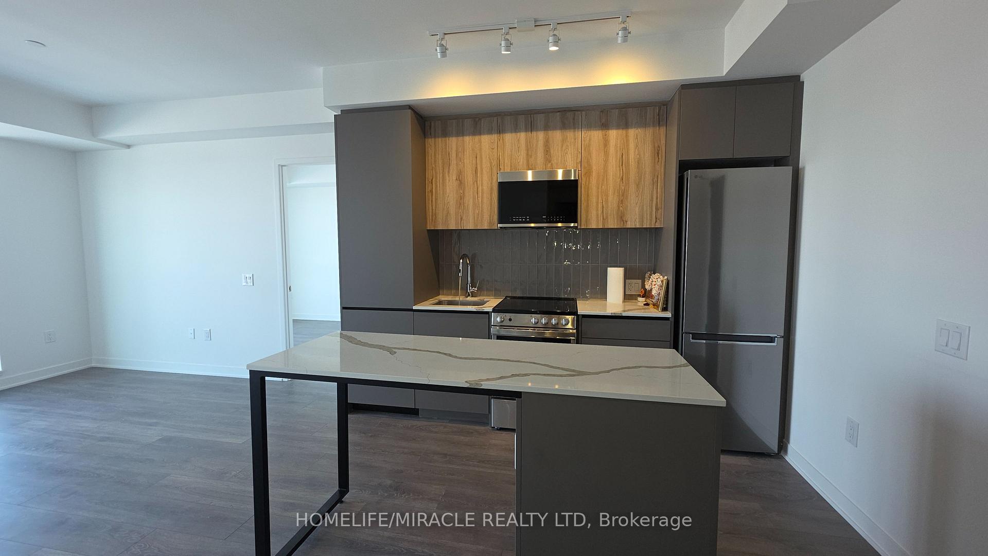Photo 4 of Unit E1401, 10 All Nations Drive, Brampton, Northwest Brampton — HOMEH