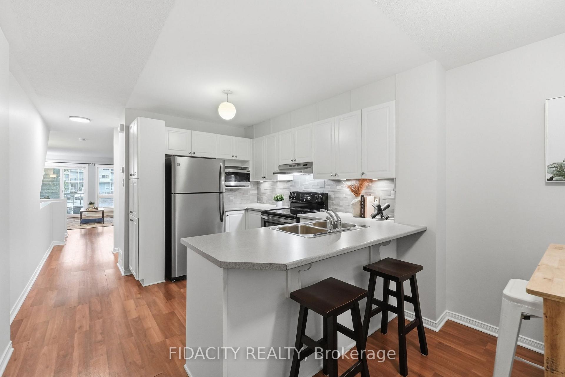 Photo 4 of Unit 55, 324 Crownridge Drive, Ottawa, Kanata - Emerald Meadows/Trailwest — HOMEH