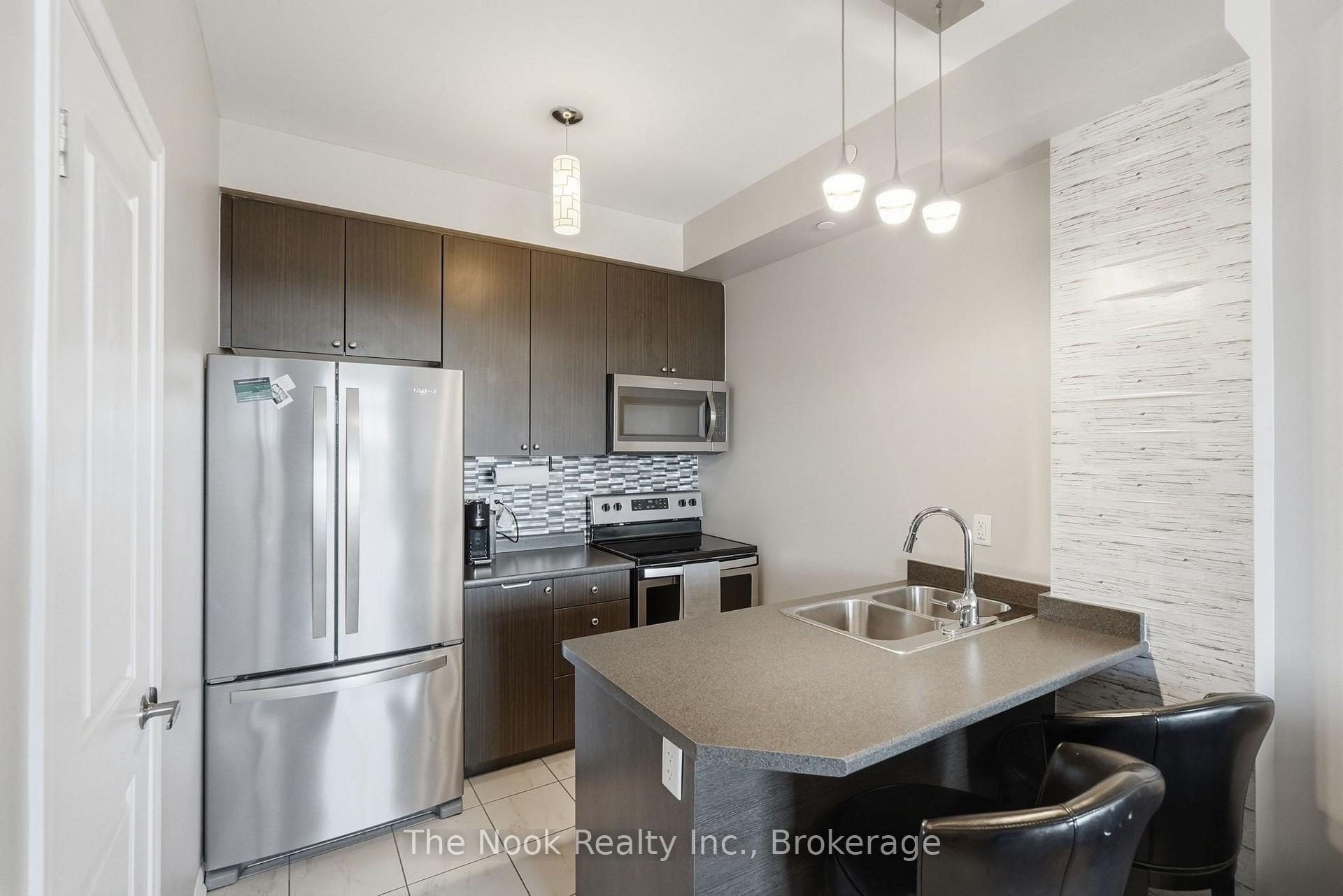 Photo 7 of Unit 420, 84 Aspen Springs Drive, Clarington, Bowmanville — HOMEH