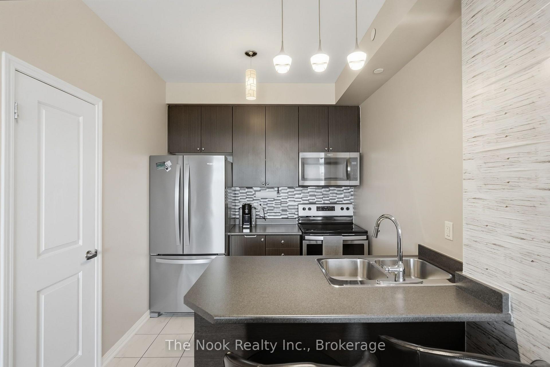 Photo 8 of Unit 420, 84 Aspen Springs Drive, Clarington, Bowmanville — HOMEH