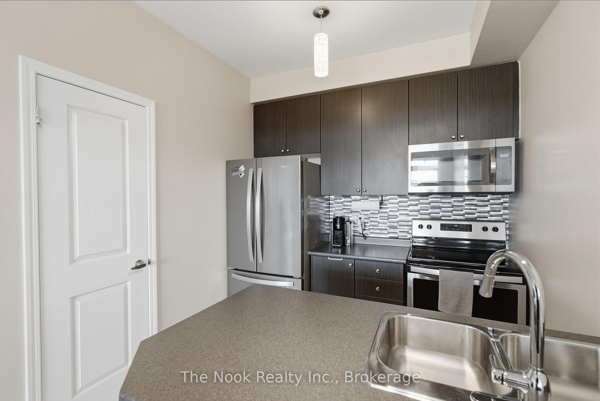 Photo 9 of Unit 420, 84 Aspen Springs Drive, Clarington, Bowmanville — HOMEH