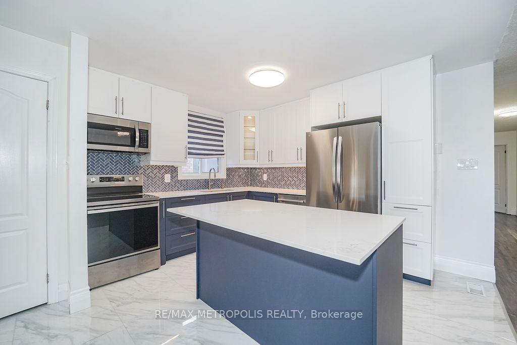 Photo 5 of Unit Main, 195 Vodden Street E, Brampton, Brampton North — HOMEH