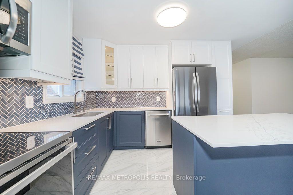 Photo 6 of Unit Main, 195 Vodden Street E, Brampton, Brampton North — HOMEH