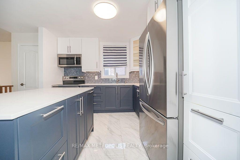 Photo 8 of Unit Main, 195 Vodden Street E, Brampton, Brampton North — HOMEH