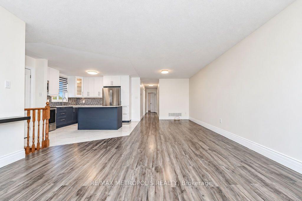 Photo 14 of Unit Main, 195 Vodden Street E, Brampton, Brampton North — HOMEH