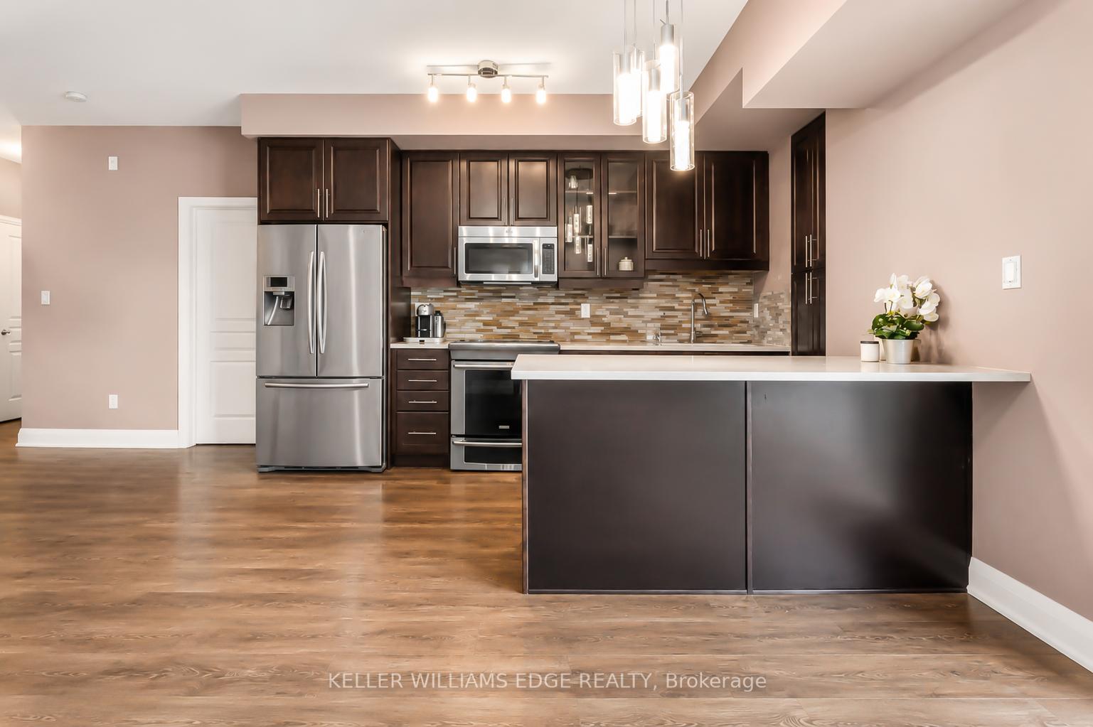 Photo 5 of Unit 413, 128 Garden Drive, Oakville, Central — HOMEH