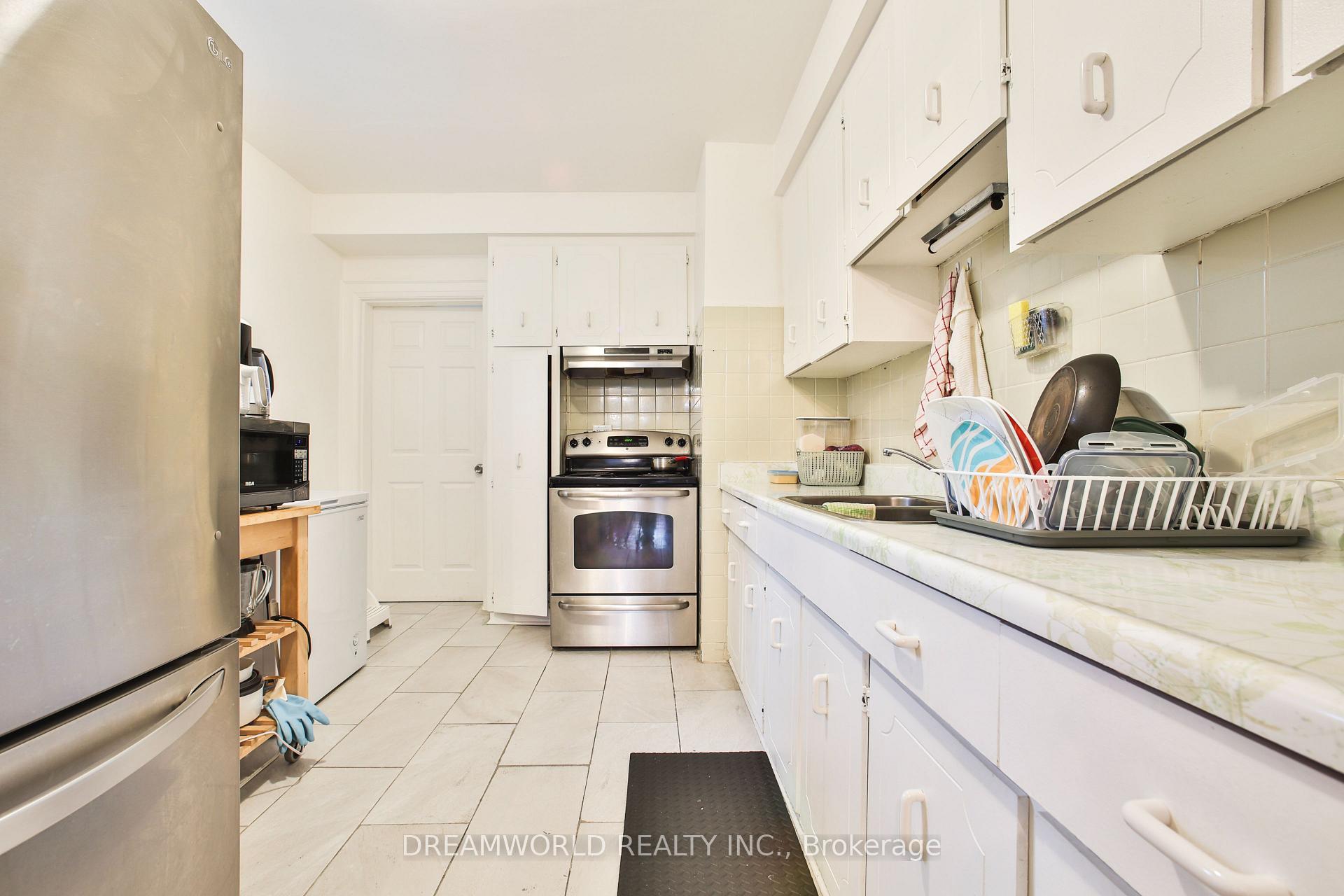 Photo 12 of 403 Northcliffe Boulevard, Toronto, Oakwood Village — HOMEH