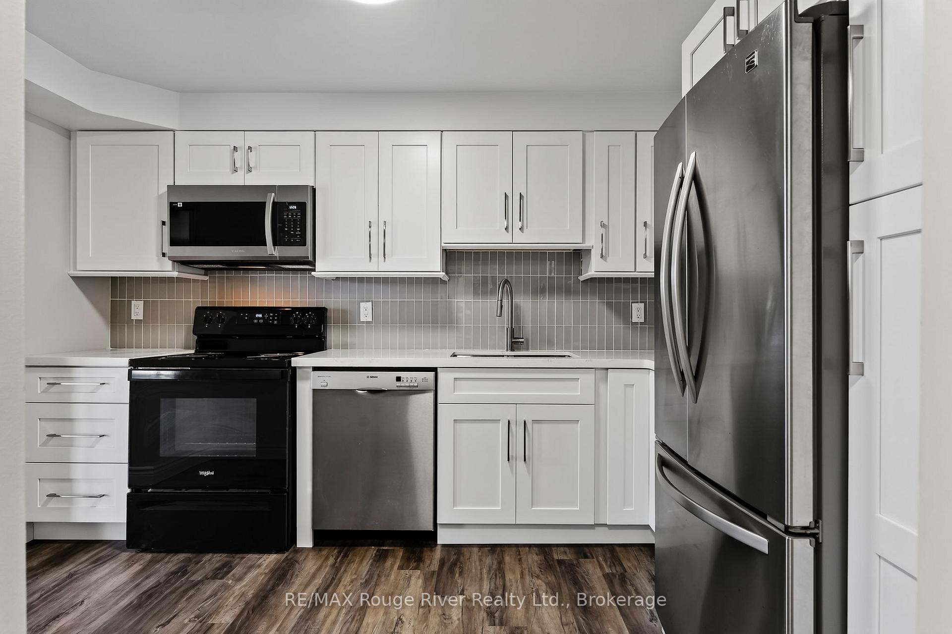 Photo 5 of Unit 402, 1 Queen Street, Cobourg — HOMEH