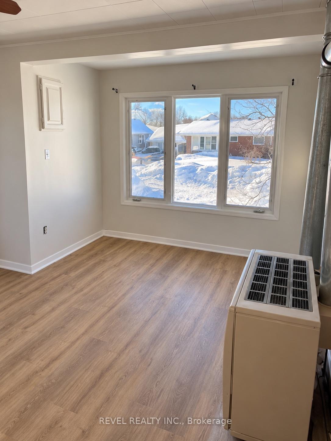 Photo 6 of 173 Front Street, Timmins, TM - Outside East — HOMEH