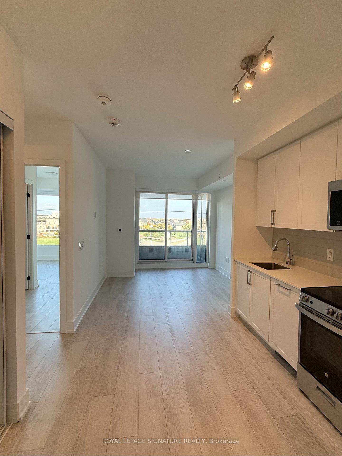 Photo 2 of Unit 410, 2450 Old Bronte Road, Oakville, Westmount — HOMEH