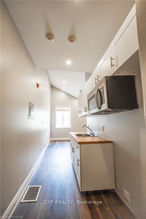 Photo 2 of Unit #2, 70 Victoria Avenue S, Hamilton, Stinson — HOMEH