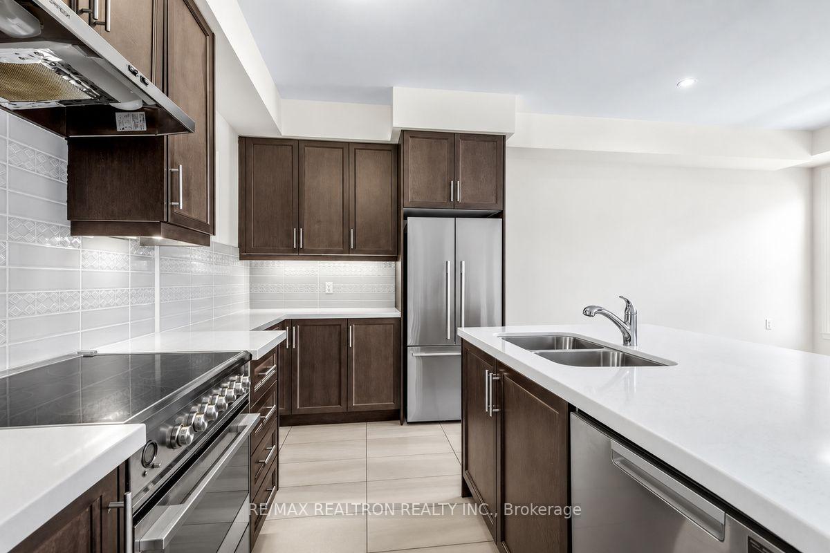 Photo 11 of Unit 2, 2A Muir Avenue, North York, Humber Summit — HOMEH