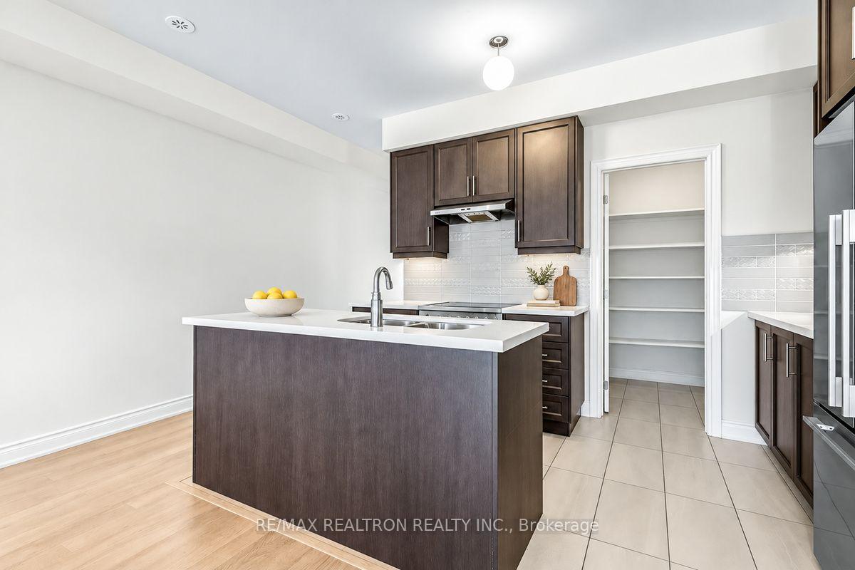 Photo 18 of Unit 2, 2A Muir Avenue, North York, Humber Summit — HOMEH