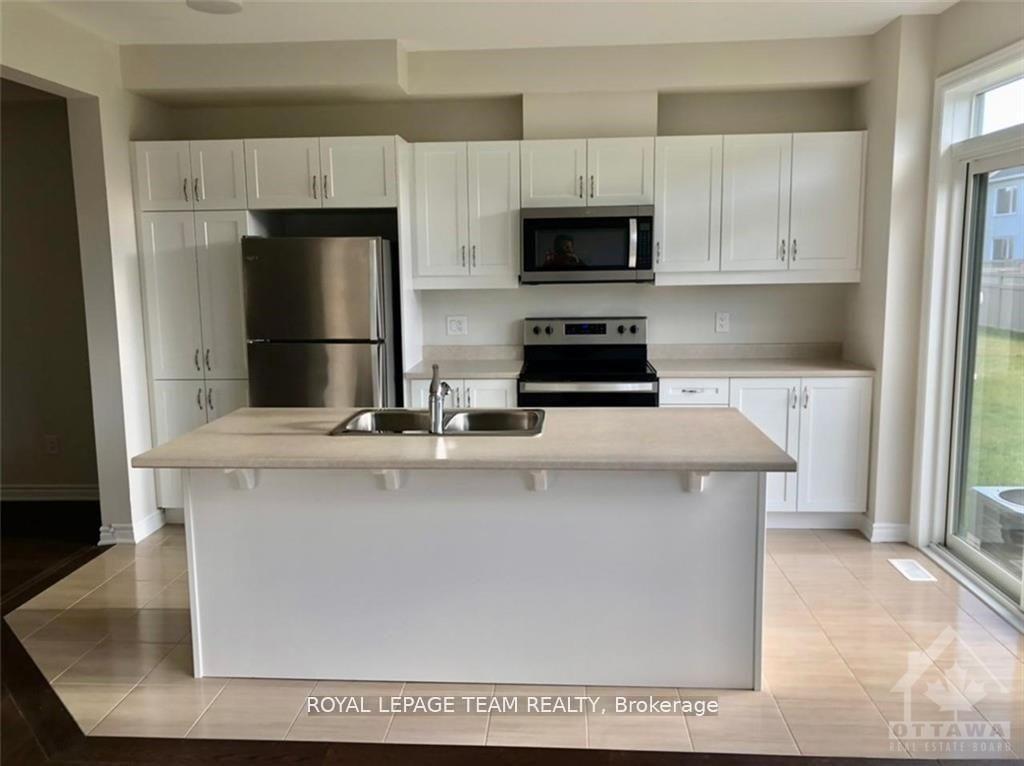 Photo 7 of 767 Brittanic Road, Ottawa, Kanata - Emerald Meadows/Trailwest — HOMEH