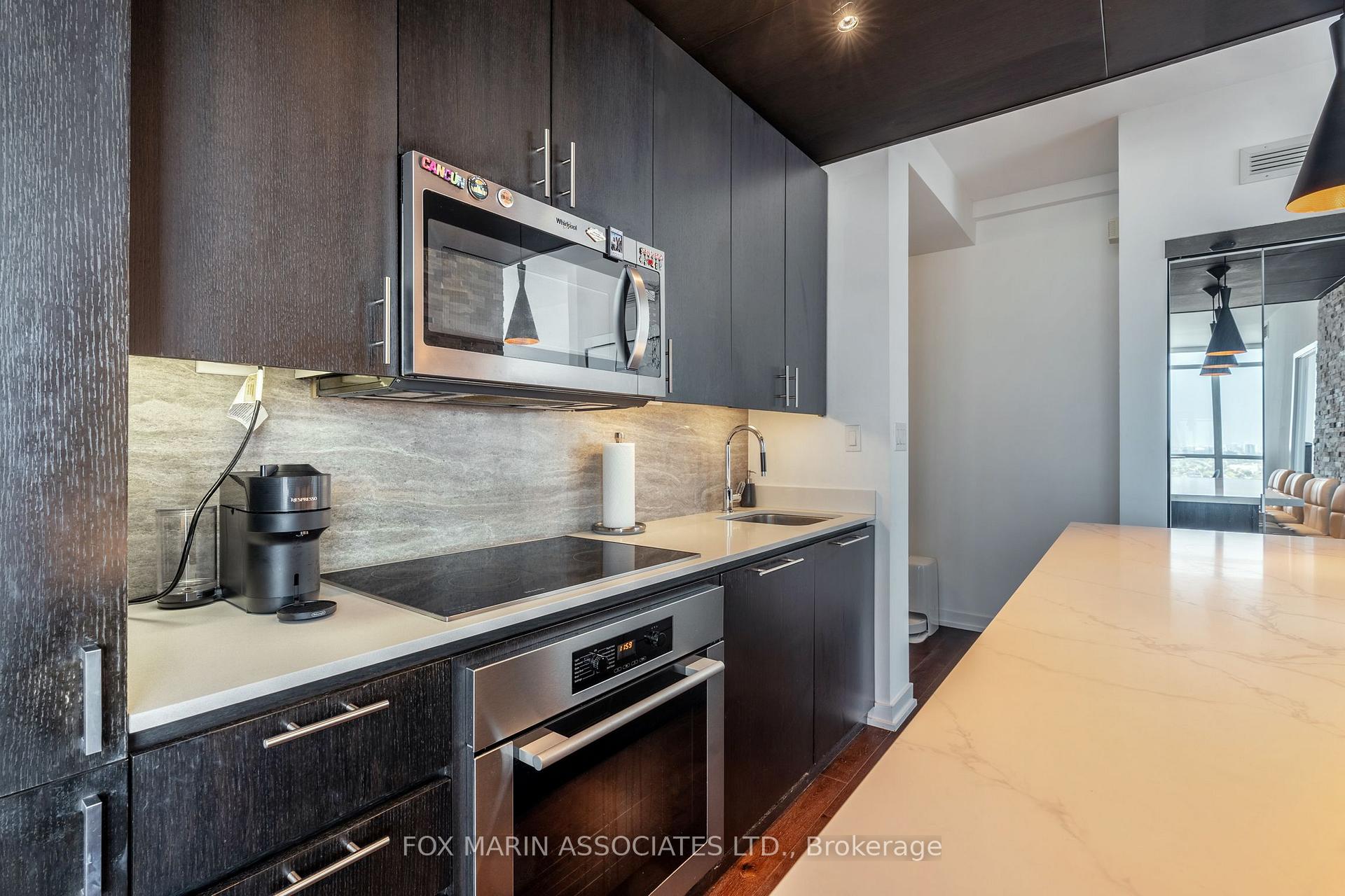 Photo 4 of Unit PH12, 15 Iceboat Terrace, Toronto, Waterfront Communities — HOMEH