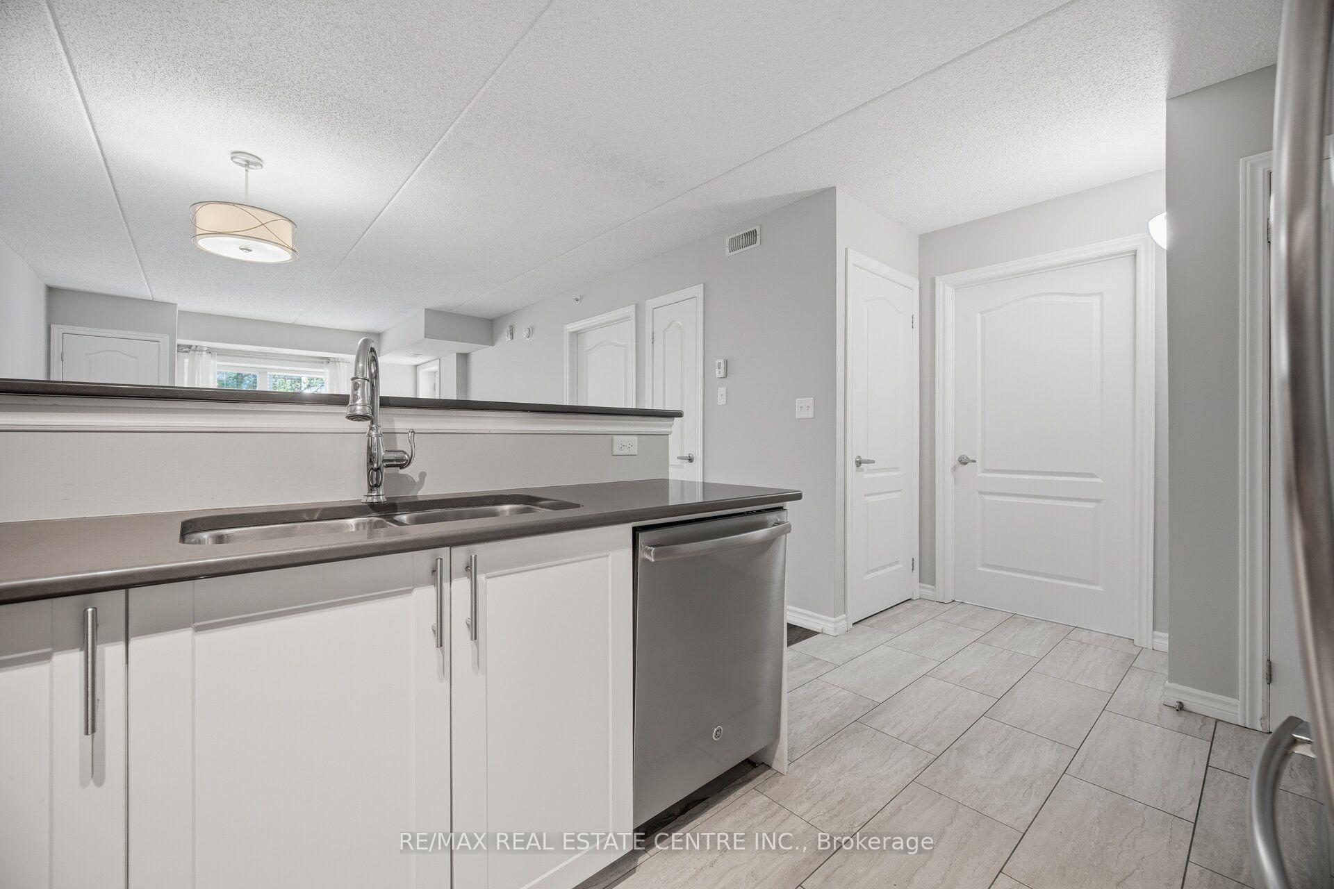 Photo 11 of Unit 103, 1450 Main Street E, Milton, Dempsey — HOMEH