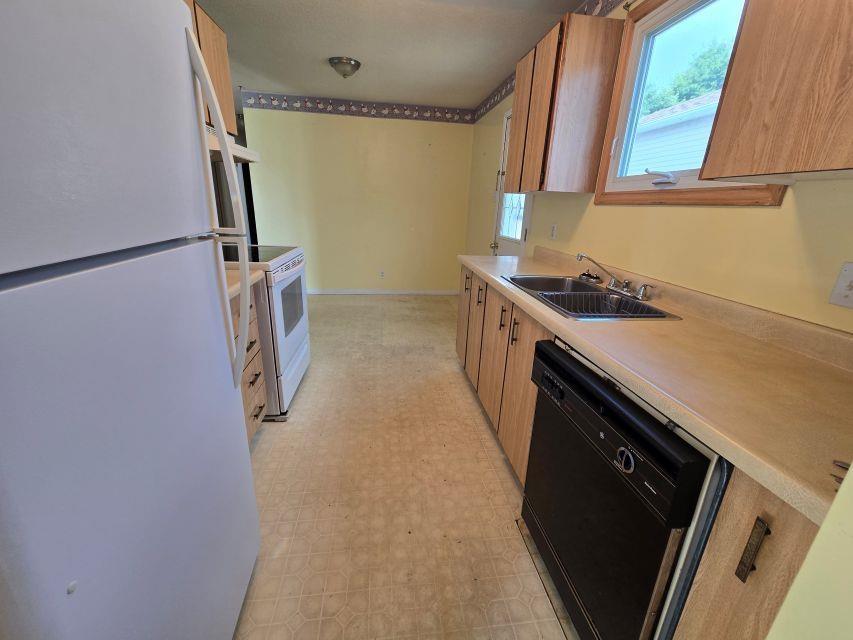 Photo 7 of 58 Taylor Boulevard, Elliot Lake — HOMEH