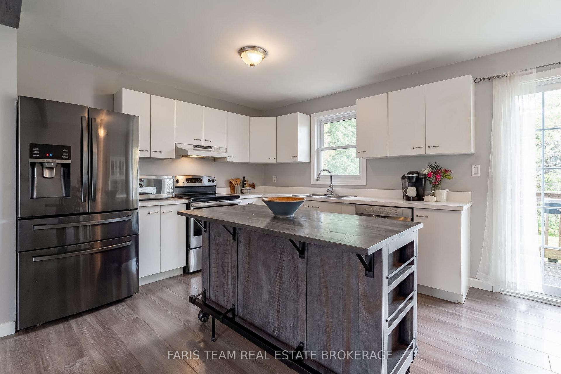 Photo 5 of 42 Dancy Drive, Orillia — HOMEH