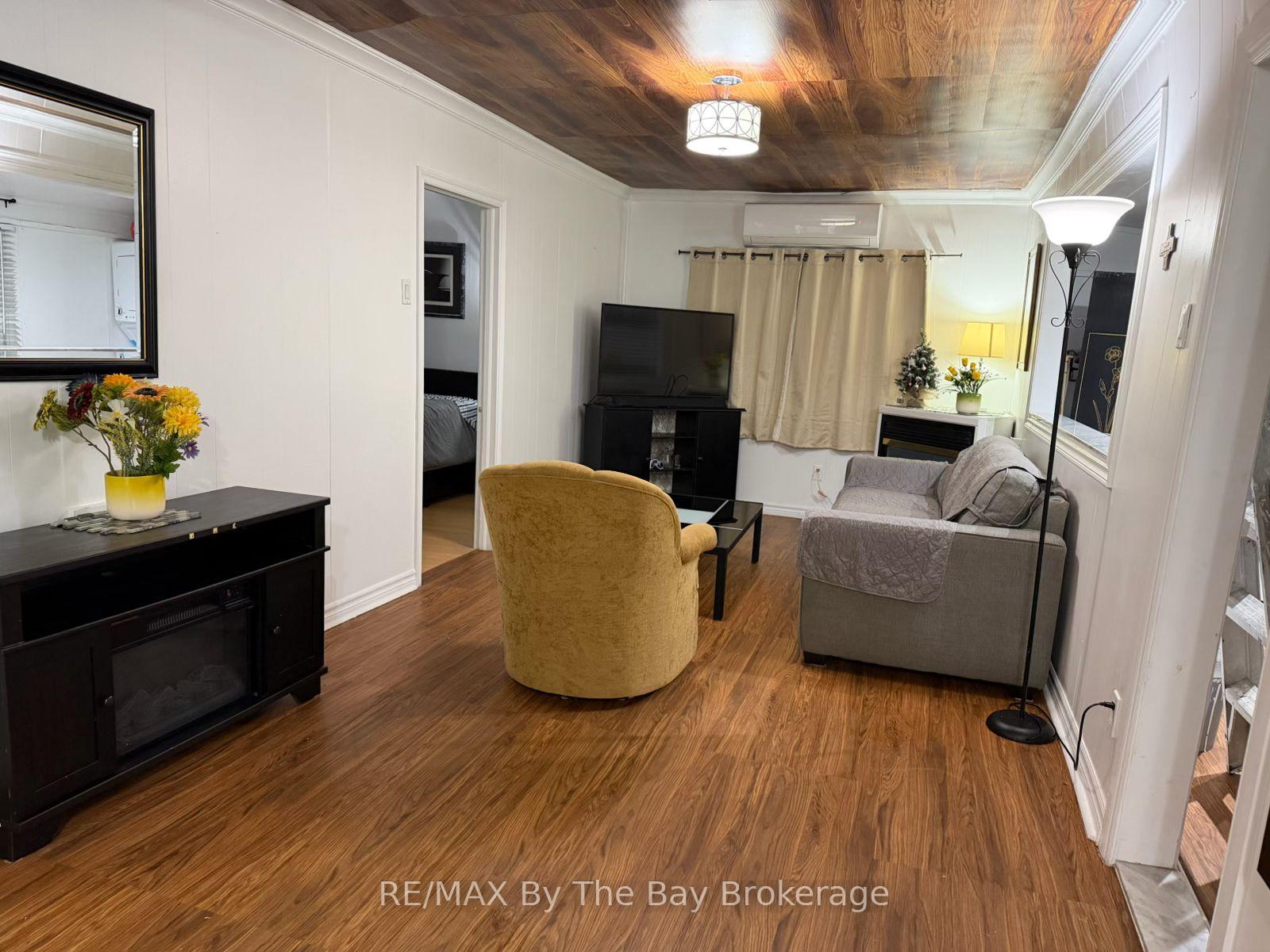 Photo 7 of 646 River Road E, Wasaga Beach — HOMEH