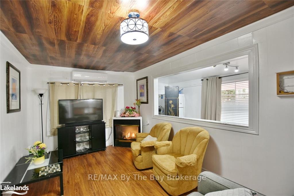 Photo 12 of 646 River Road E, Wasaga Beach — HOMEH